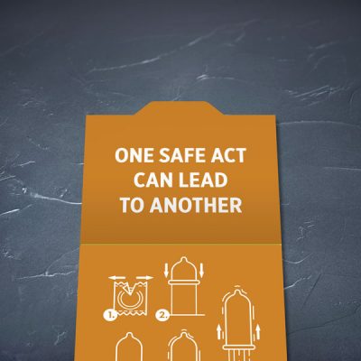 Prezervatīvs, dadzis, ar attēlotu aizsargķiveri un tekstu - Safety first