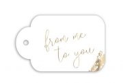 balta dāvanu kartīte ar zelta uzrakstu "From Me to You"